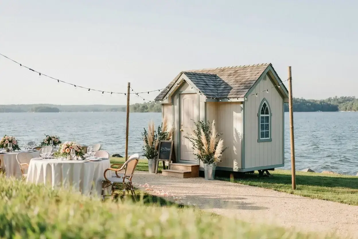 Luxury restroom trailer set up near Lake Murray for an outdoor wedding or event